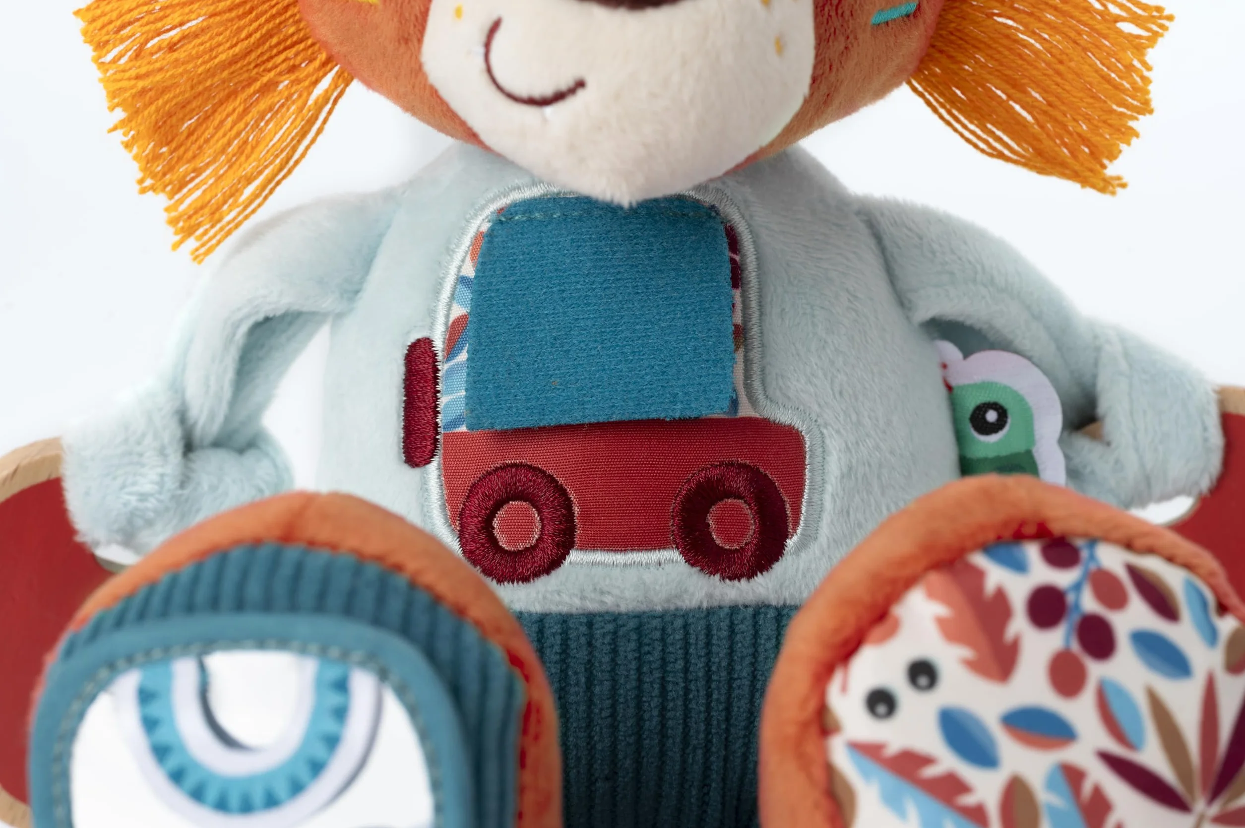 LILLIPUTIENS - Peluche attività Jack Il Leone - Sonaglio interattivo per Bambini con Specchio, campanella e Rumore di Carta - Stimola i Sensi, Le capacità motorie e l'immaginazione - 9 Mesi+