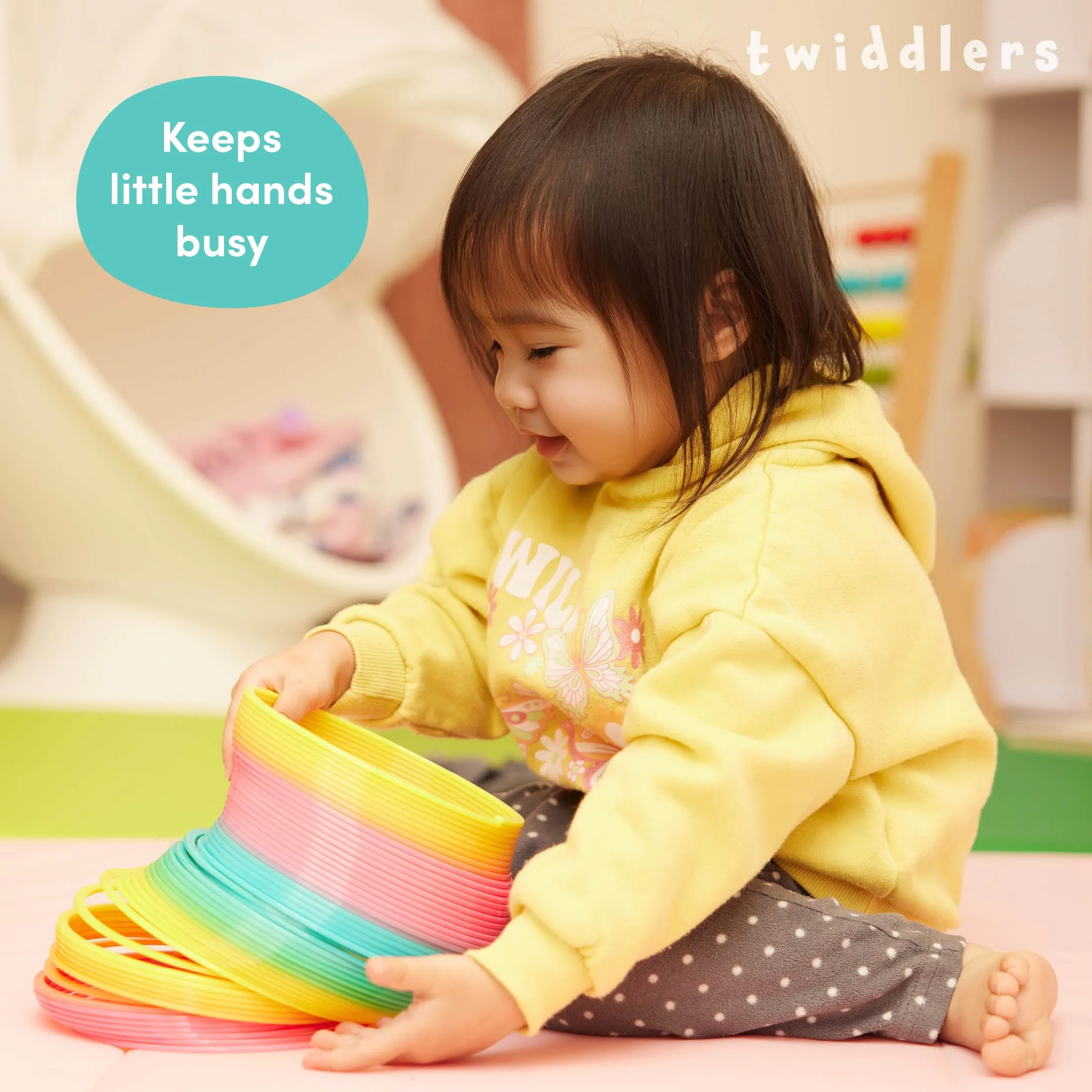 THE TWIDDLERS - Molla Giocattolo Gigante Arcobaleno in Plastica – Molle Arcobaleno Divertenti per Bambini - 15x15cm