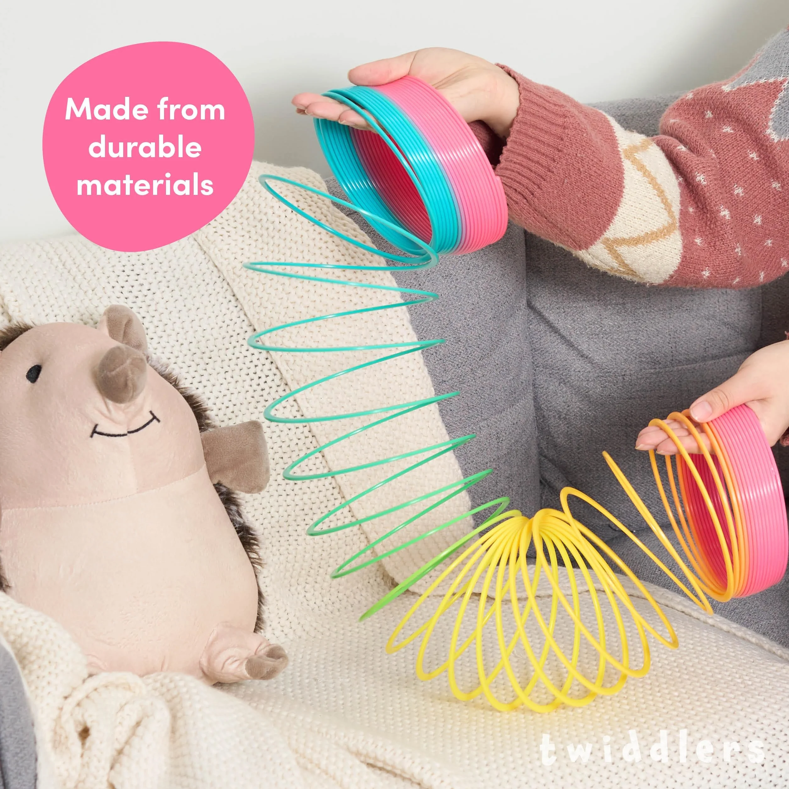 THE TWIDDLERS - Molla Giocattolo Gigante Arcobaleno in Plastica – Molle Arcobaleno Divertenti per Bambini - 15x15cm