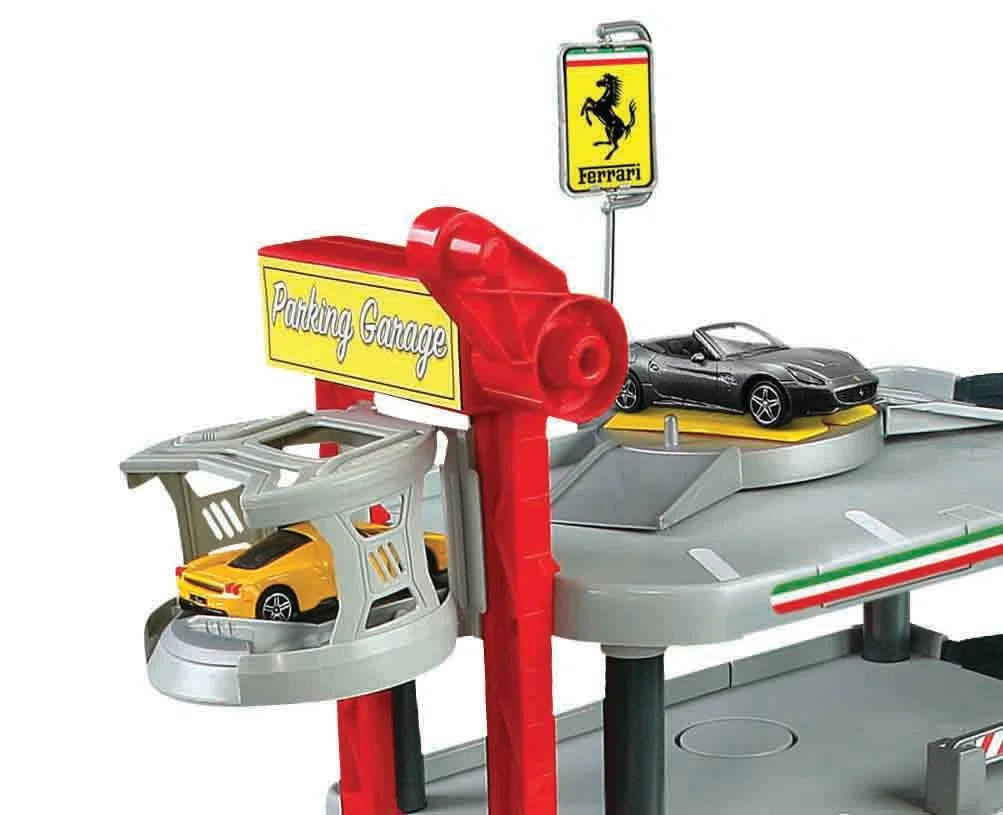 Bburago 15631204 - Parcheggio Ferrari incl 2 auto 1:43