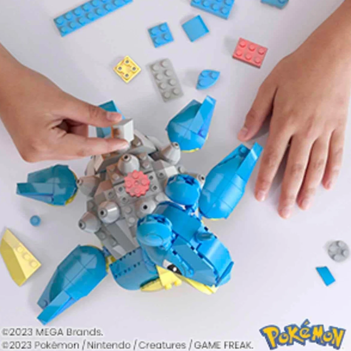 MEGA Pokémon - Lapras da costruire e collezionare con 527 pezzi e sistema Mattoncino movimento, alto 17+ cm, personaggio da esporre, giocattolo per bambini, 8+ anni, HKT26