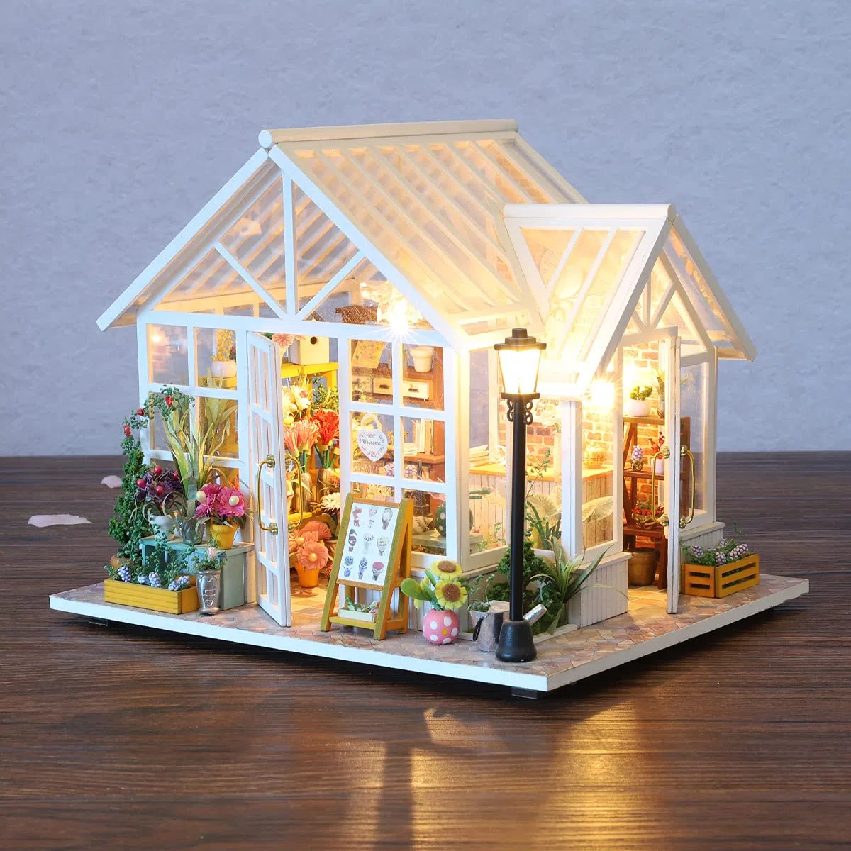 GuDoQi Miniatura Casa Delle Bambole, Kit Casa Bambole In Legno 3D Con Mobili E Musica, Luce A Led, Mini Kit Casa Fatta a Mano da Costruire, Bellissimo Negozio di Fiori